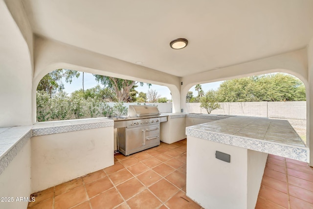 6215 E Surrey Ave, Scottsdale, AZ 85254 - fenced backyard featuring area for grilling and a patio area