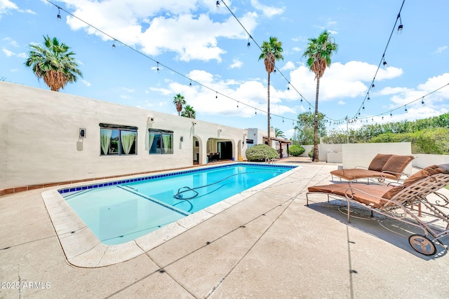 6215 E Surrey Ave, Scottsdale, AZ 85254 - view of swimming pool featuring a patio