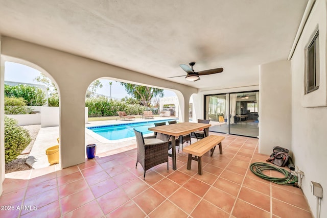 6215 E Surrey Ave, Scottsdale, AZ 85254 - fenced backyard with a patio area, ceiling fan, and outdoor dining area