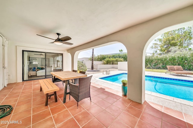6215 E Surrey Ave, Scottsdale, AZ 85254 - view of swimming pool featuring a patio, ceiling fan, and outdoor dining space
