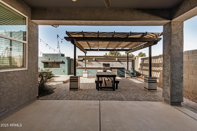 view of patio featuring a pergola and grilling area