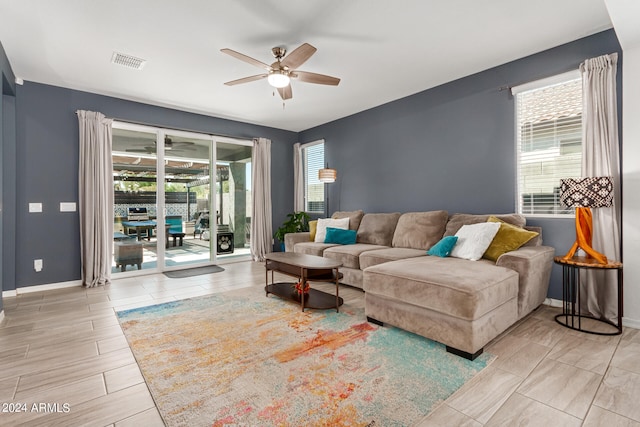 living room with ceiling fan