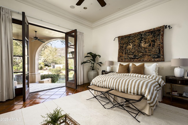 bedroom with crown molding, french doors, tile patterned flooring, and access to exterior