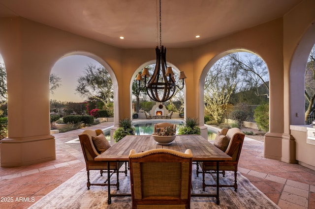 patio terrace at dusk with outdoor dining area