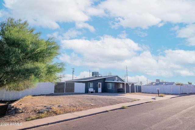 view of front of property featuring cooling unit