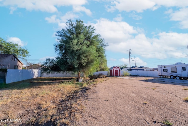 view of yard with a shed