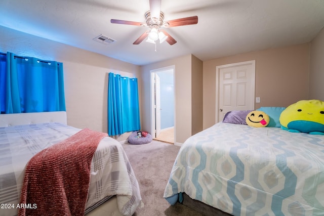 bedroom with carpet flooring and ceiling fan