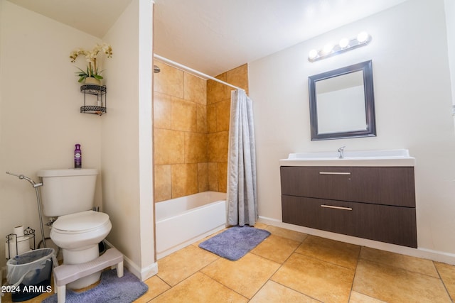 full bathroom with shower / bath combination with curtain, tile patterned floors, vanity, and toilet