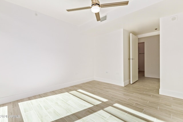 4808 N 24th St Unit 230, Phoenix, AZ 85016 - empty room featuring light wood finished floors, baseboards, and ceiling fan