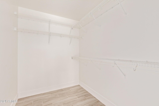 4808 N 24th St Unit 230, Phoenix, AZ 85016 - spacious closet featuring light wood-type flooring