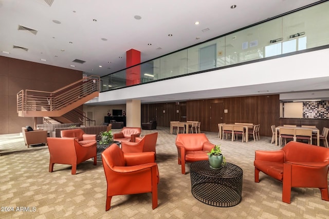 4808 N 24th St Unit 230, Phoenix, AZ 85016 - community lobby with a towering ceiling, wooden walls, and stairway