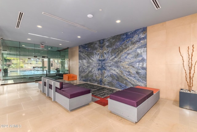 4808 N 24th St Unit 230, Phoenix, AZ 85016 - community lobby with tile walls, recessed lighting, and floor to ceiling windows