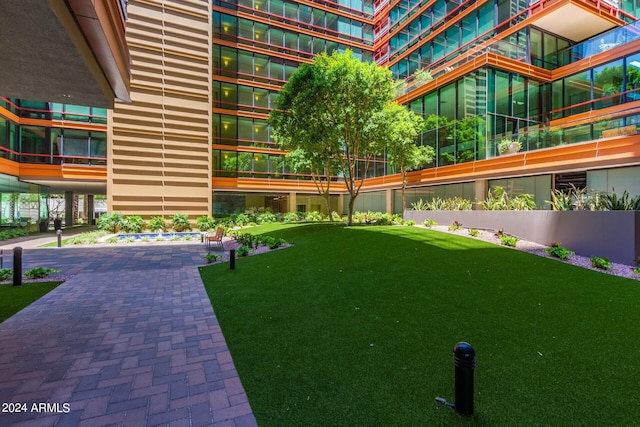 4808 N 24th St Unit 230, Phoenix, AZ 85016 - view of home's community with a lawn