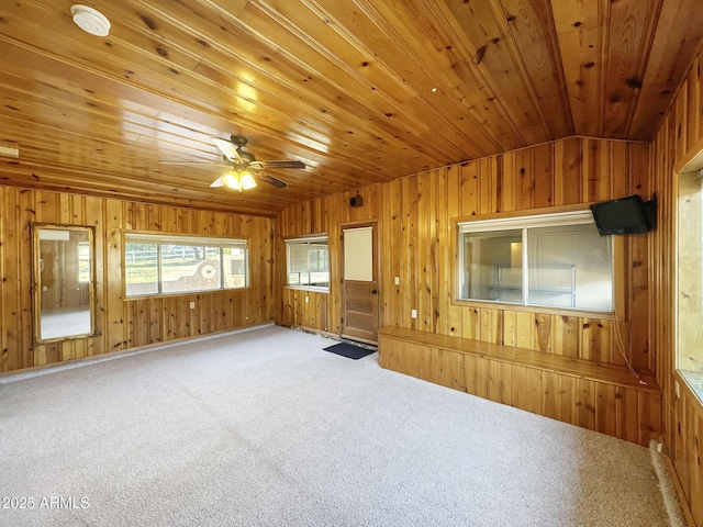 9107 W Fossil Creek Rd, Strawberry, AZ 85544 - carpeted spare room featuring wooden walls, a ceiling fan, lofted ceiling, and wooden ceiling