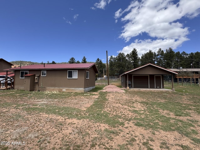 9107 W Fossil Creek Rd, Strawberry, AZ 85544 - view of yard with an outbuilding and a garage