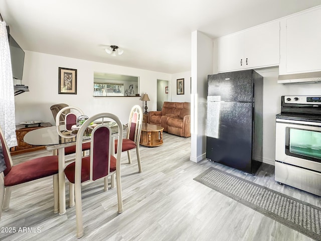 9107 W Fossil Creek Rd, Strawberry, AZ 85544 - dining room with light wood-type flooring and baseboards