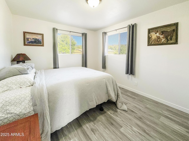 9107 W Fossil Creek Rd, Strawberry, AZ 85544 - bedroom featuring wood finished floors and baseboards