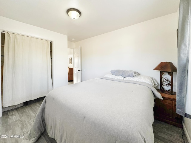 9107 W Fossil Creek Rd, Strawberry, AZ 85544 - bedroom featuring wood finished floors and a closet