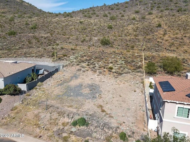 drone / aerial view featuring a mountain view