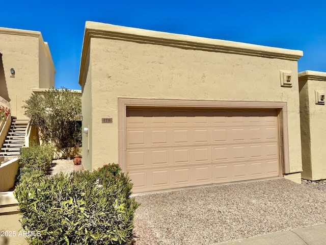 garage featuring driveway