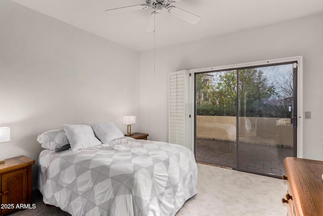 bedroom with carpet floors, a ceiling fan, and access to exterior