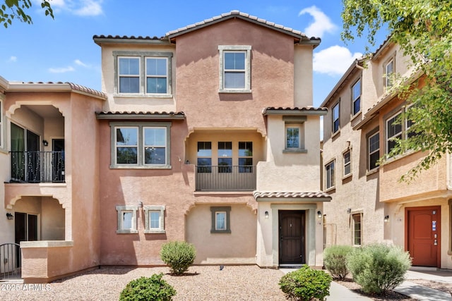 7718 W Pipestone Pl, Phoenix, AZ 85035 - view of property with stucco siding and a tile roof