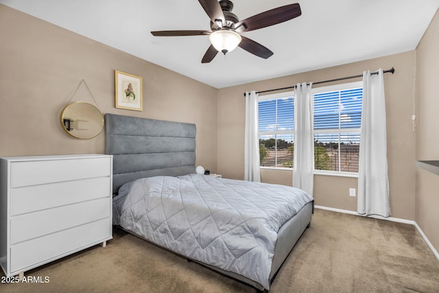 7718 W Pipestone Pl, Phoenix, AZ 85035 - carpeted bedroom featuring baseboards and a ceiling fan