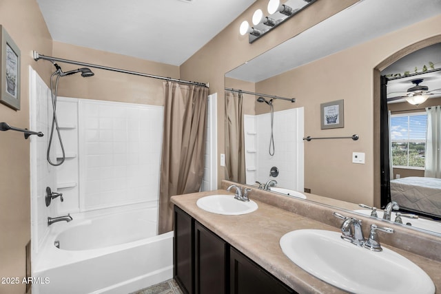 7718 W Pipestone Pl, Phoenix, AZ 85035 - ensuite bathroom featuring shower / bath combination with curtain and double vanity