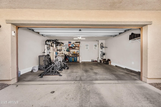 7718 W Pipestone Pl, Phoenix, AZ 85035 - garage featuring baseboards