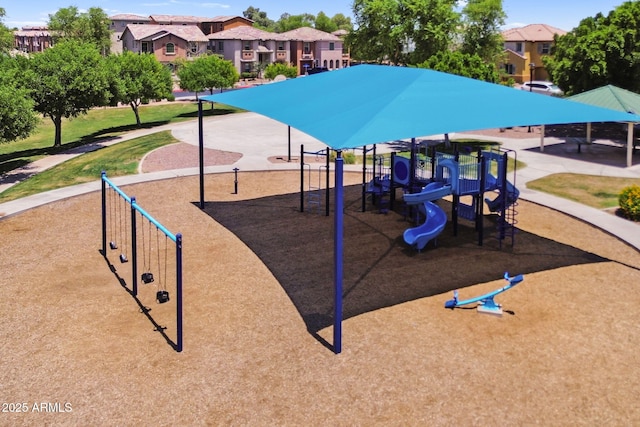 7718 W Pipestone Pl, Phoenix, AZ 85035 - community play area featuring a residential view