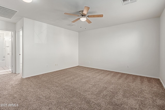 unfurnished room with carpet flooring and ceiling fan