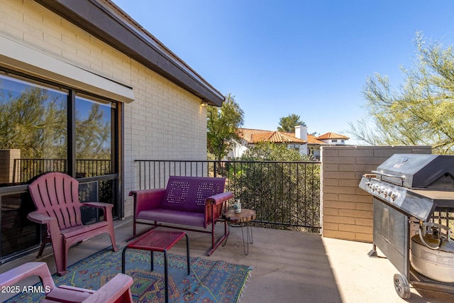 view of patio with a grill