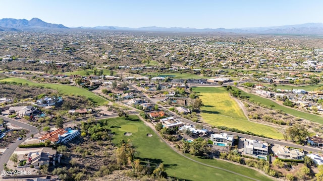 birds eye view of property with a mountain view, golf course view, and a residential view