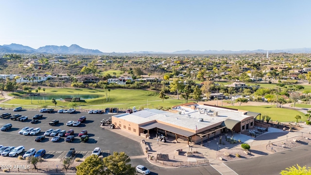 aerial view featuring a mountain view and golf course view