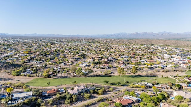 aerial view featuring a mountain view and a residential view