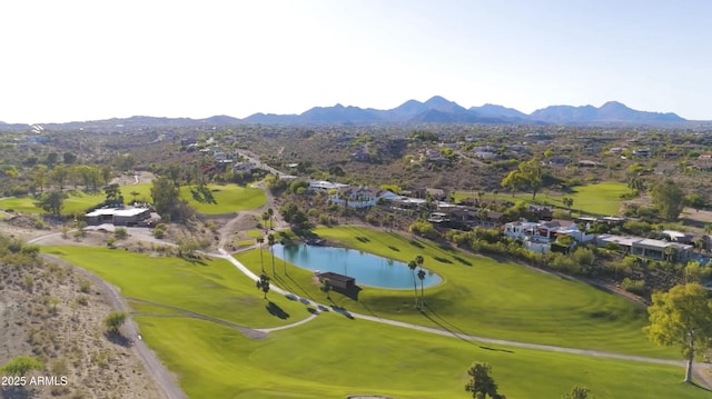birds eye view of property with a residential view, view of golf course, and a water and mountain view