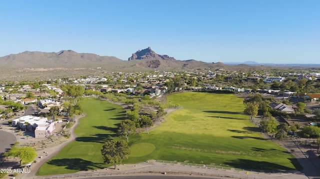 birds eye view of property featuring golf course view, a mountain view, and a residential view