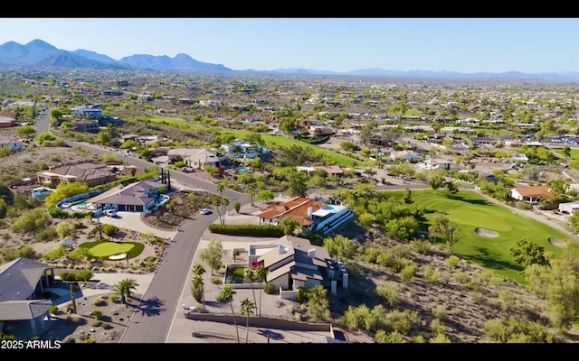 birds eye view of property with a residential view, a mountain view, and view of golf course