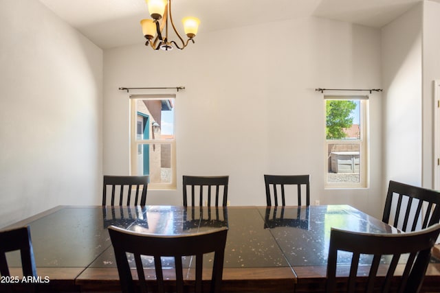 3501 Camino Bella Rosa, Sierra Vista, AZ 85650 - dining space featuring an inviting chandelier and lofted ceiling