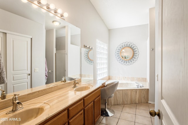 3501 Camino Bella Rosa, Sierra Vista, AZ 85650 - bathroom featuring a sink, tile patterned flooring, a bath, and lofted ceiling