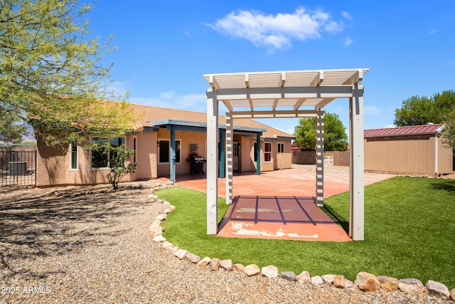 3501 Camino Bella Rosa, Sierra Vista, AZ 85650 - back of house with a lawn, stucco siding, fence, and a pergola
