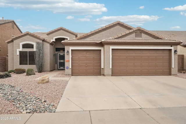 single story home featuring a garage