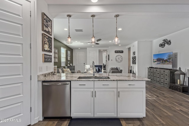 19415 W College Dr, Litchfield Park, AZ 85340 - kitchen featuring stainless steel dishwasher, a sink, open floor plan, dark wood-style flooring, and a ceiling fan
