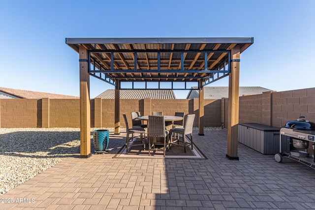 19415 W College Dr, Litchfield Park, AZ 85340 - fenced backyard with a patio area, a grill, and outdoor dining area