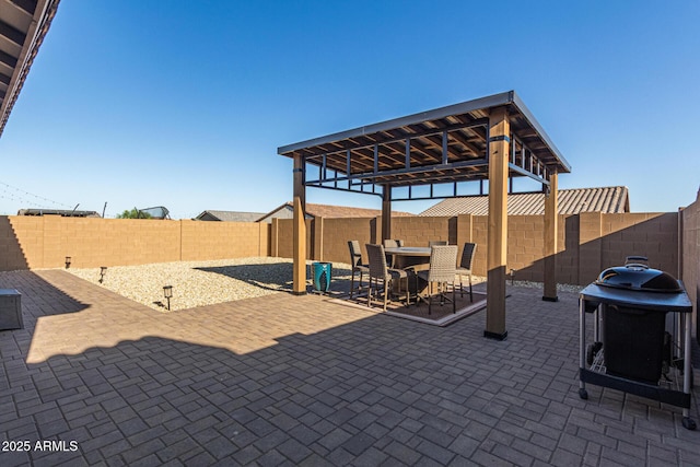 19415 W College Dr, Litchfield Park, AZ 85340 - fenced backyard with a patio area and outdoor dining space