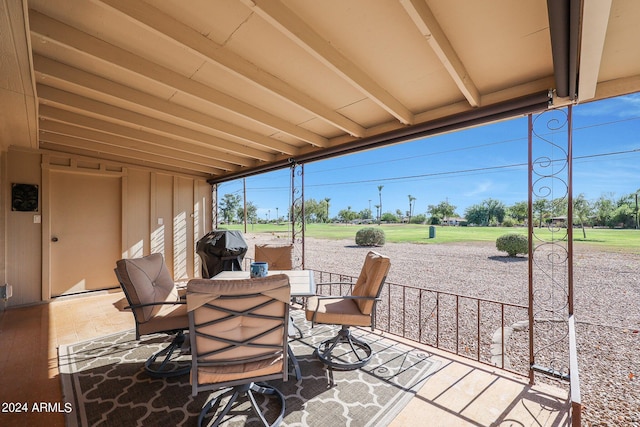 view of patio with outdoor dining space and area for grilling