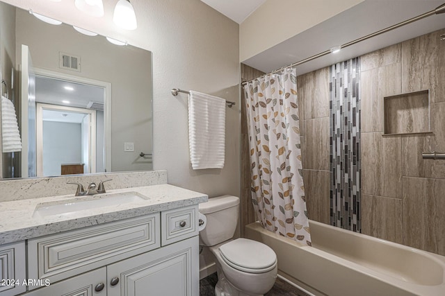 bathroom with shower / bath combo, vanity, visible vents, and toilet