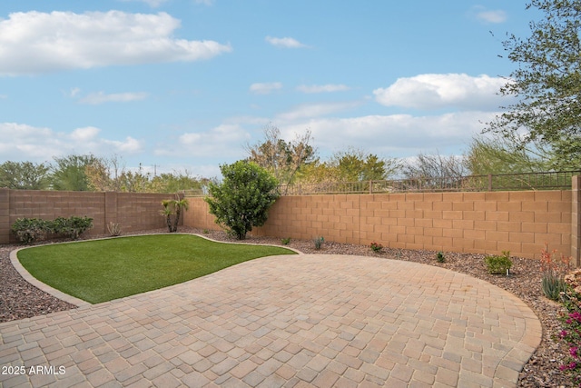 view of patio with a fenced backyard