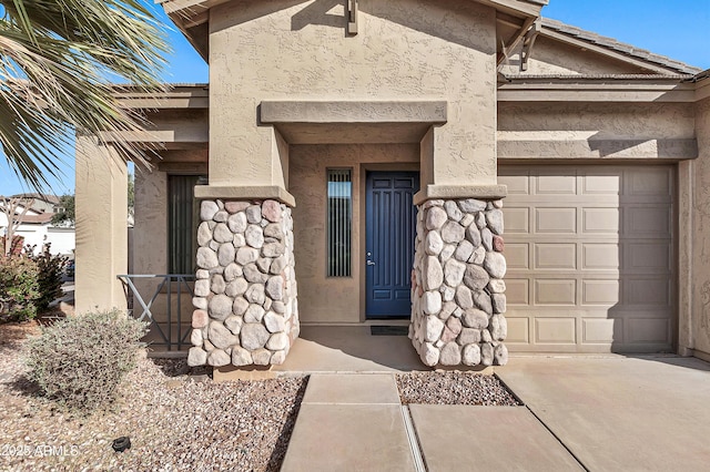 entrance to property featuring a garage