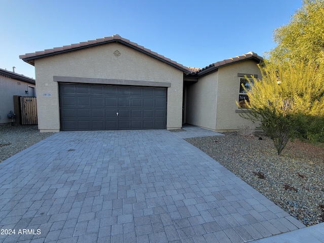 view of front of property featuring a garage